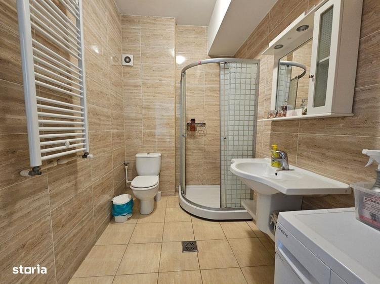 Apartament de vanzare in Summerland vedere laterala catre ac si mare - 6