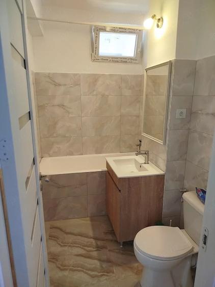 Apartament cu 3 camere decomandat, mobilat în Tractorul