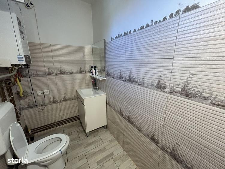 Vand casa din caramida, st.494 mp, sc.131 mp, cu 4 cam.2 bai, moderna - 12