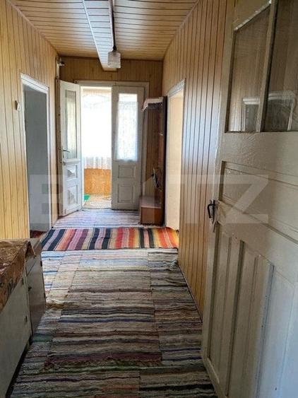 Casă individuală cu 3 camere cu Teren 1048 Mp în Siret