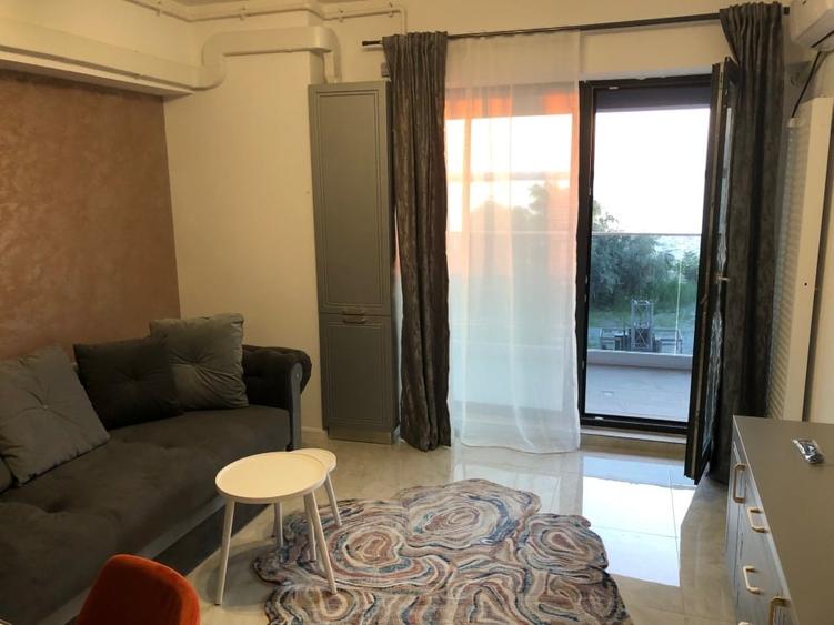 Apartament cu 2 camere semidecomandat, mobilat în Central