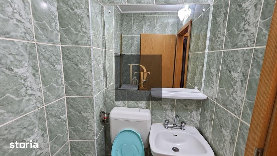 Apartament cu 3 camere decomandat în Tractorul