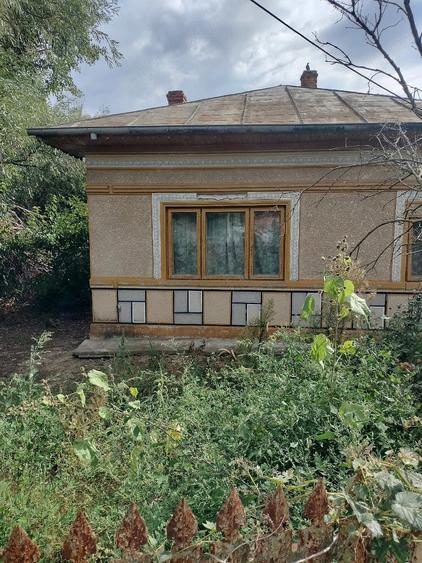 Casă cu Teren 750 Mp în Hotarele