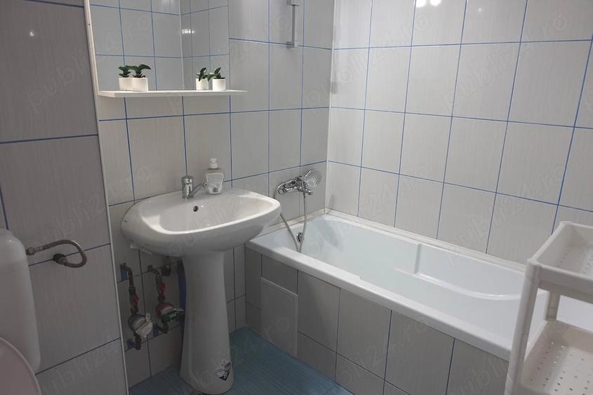Apartament cu 3 camere semidecomandat, mobilat în Gara de Nord