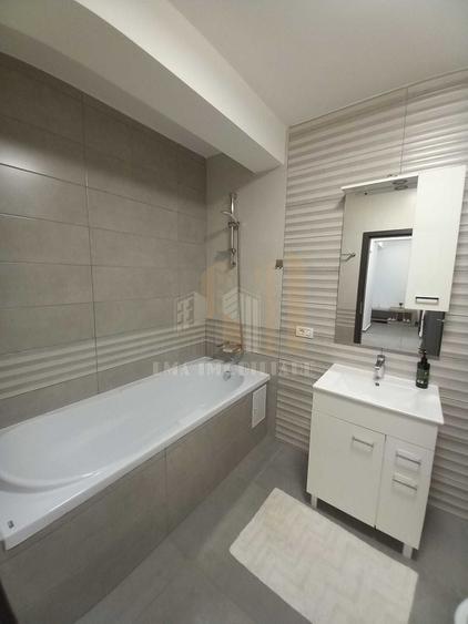 Apartament cu 2 camere decomandat, mobilat în Tractorul