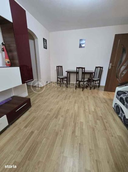 Apartament cu 2 camere semidecomandat în Podu Roș