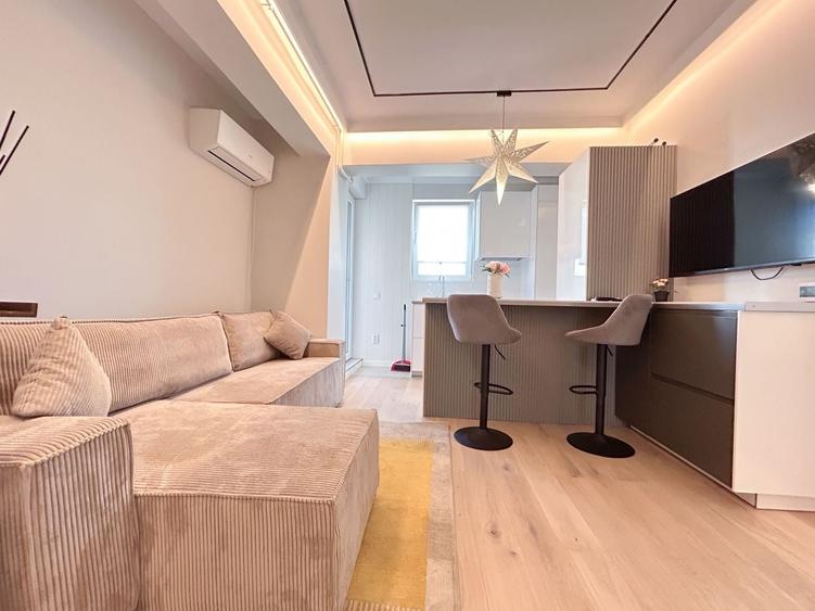Apartament cu 2 camere semidecomandat, mobilat în Central