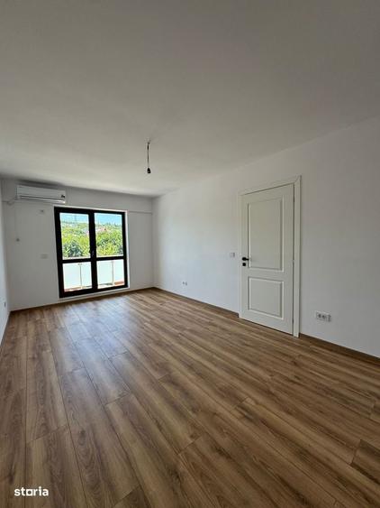 Apartament cu 2 camere decomandat în Bucium — fotografia 1