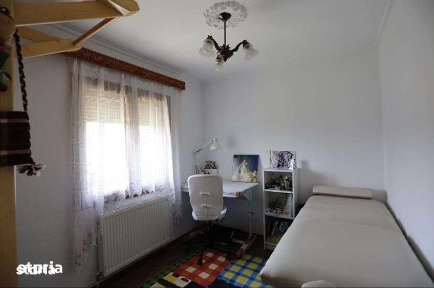 Casă cu 4 camere cu Teren 1400 Mp în Răucești