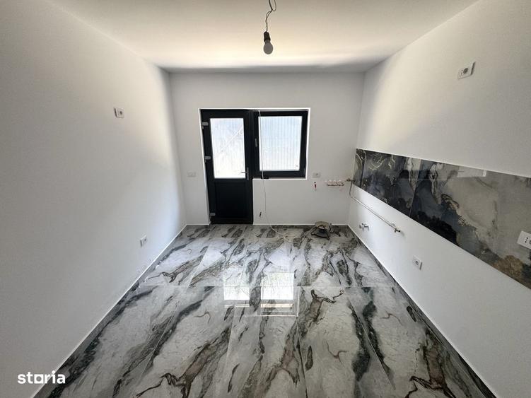 Casă cu 4 camere în Bucium