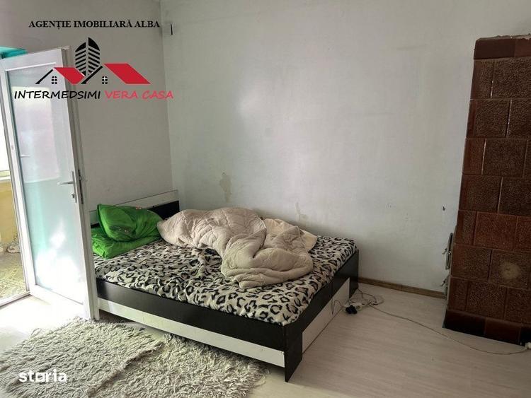Casă cu 4 camere în Teiu