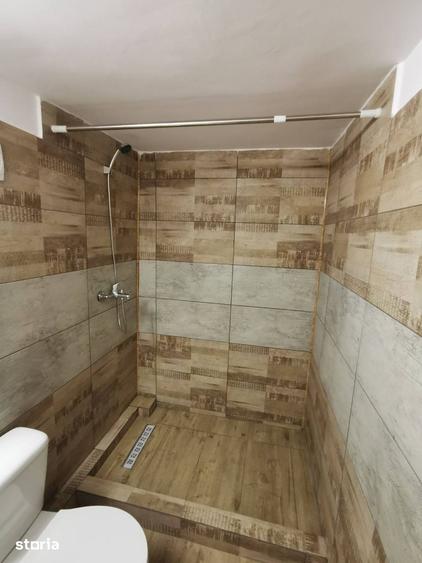 Casă cu 4 camere cu Teren 1000 Mp în Central