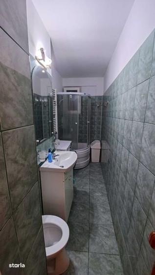 Garsonieră decomandată în Titan