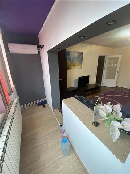 Apartament cu 2 camere semidecomandat, mobilat în Aradului
