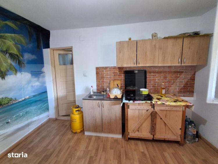Casă cu 3 camere în Podu Corbului