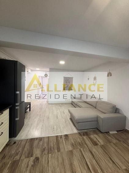 Apartament cu 3 camere semidecomandat, mobilat în Central