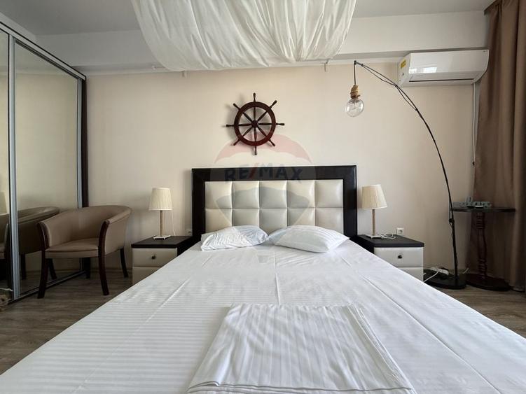 Apartament cu 2 camere semidecomandat, mobilat în Central
