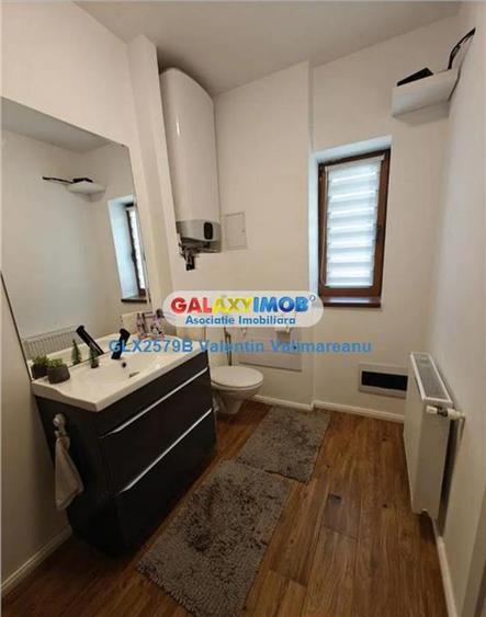 Casă cu 4 camere cu Teren 187 Mp în 1 Decembrie