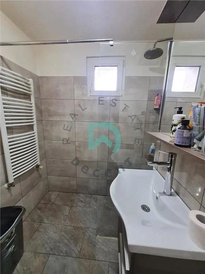 Apartament cu 3 camere decomandat în Craiter