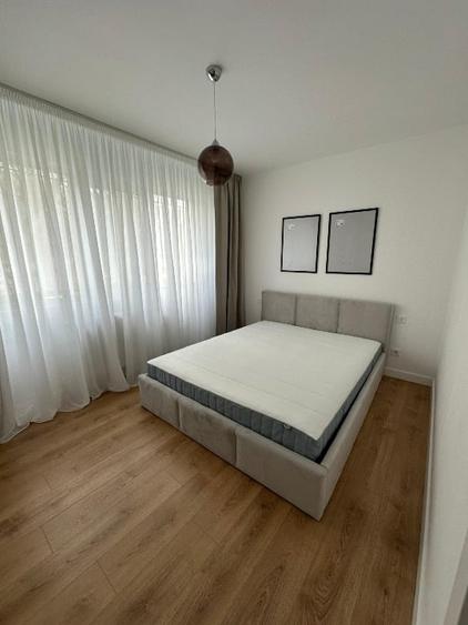 Apartament cu 2 camere semidecomandat, mobilat în Podu Roș