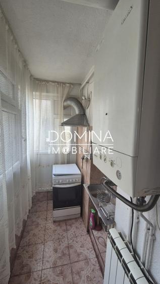 Apartament cu 3 camere semidecomandat, mobilat în Central