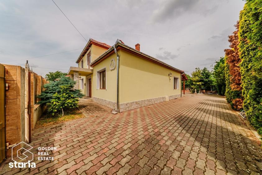 Casă cu Teren 1597 Mp în Ghioroc