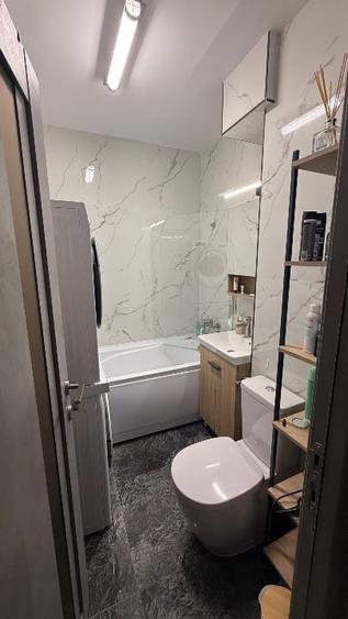 Apartament cu 3 camere decomandat, mobilat în Alexandru cel Bun