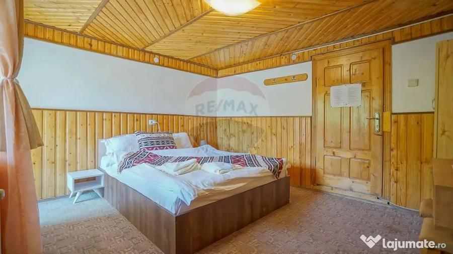 Casă cu 10 camere cu Teren 1137 Mp în Moieciu