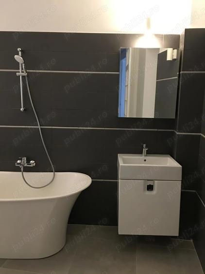 Apartament cu 4 camere decomandat în Central