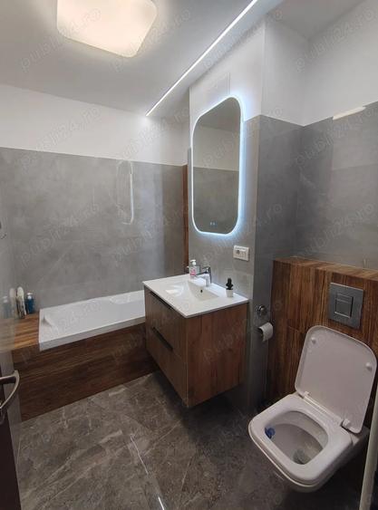 Apartament cu 3 camere decomandat în Dâmbovița
