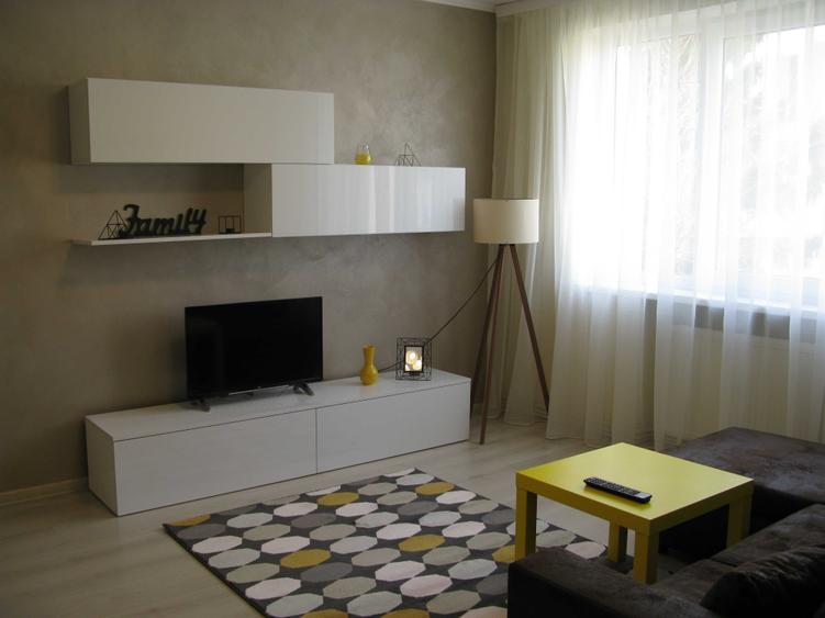 Apartament cu 2 camere semidecomandat, mobilat în Central