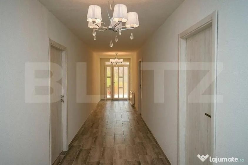 Casă cu 10 camere cu Teren 1100 Mp în Corunca