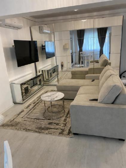 Apartament cu 2 camere semidecomandat, mobilat în Central