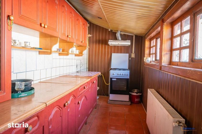 Casă cu 7 camere cu Teren 1834 Mp în Coman