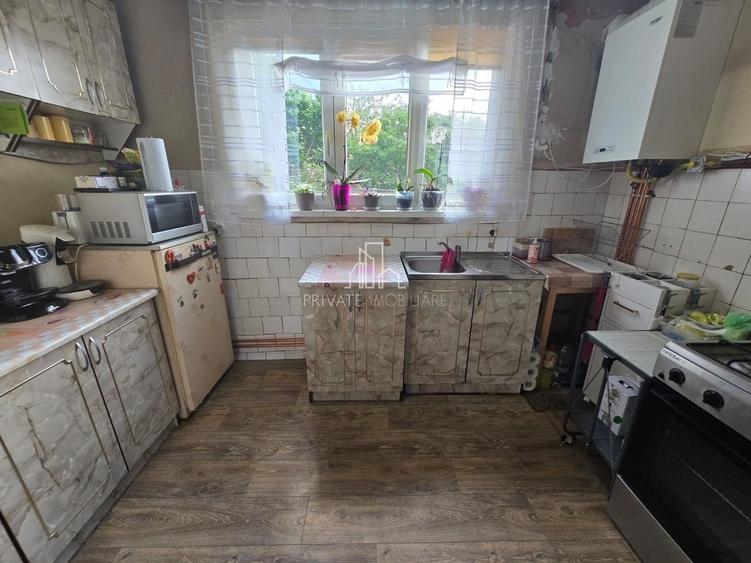 Casă individuală cu 5 camere cu Canalizare în Central