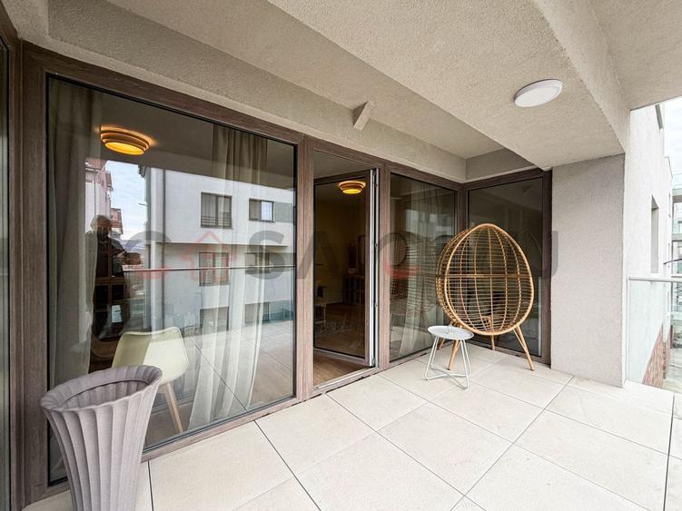 Apartament cu 3 camere semidecomandat, mobilat în Borhanci