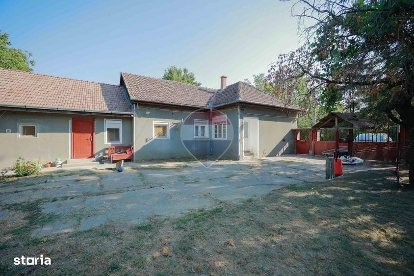Casă cu 4 camere în Santăul Mare
