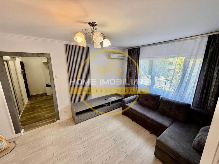 Apartament cu 2 camere semidecomandat, mobilat în Podu Roș