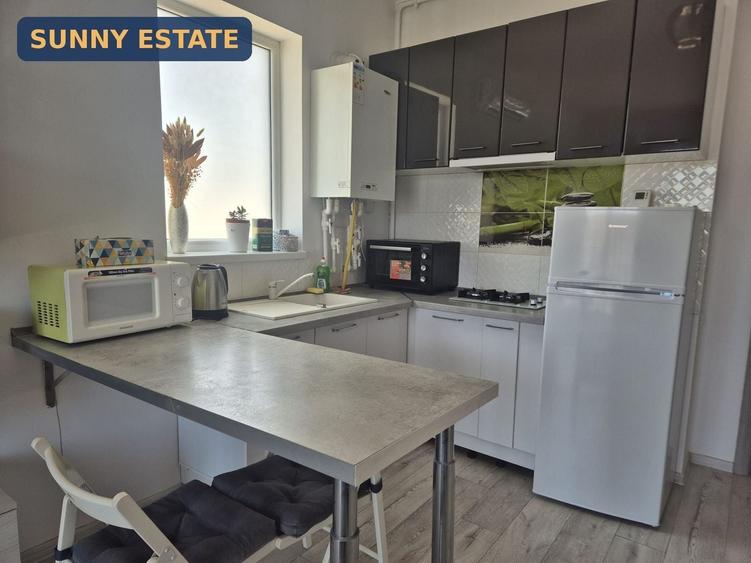 Apartament cu 2 camere semidecomandat, mobilat în Central