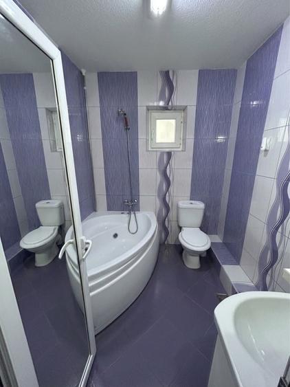 Ap. 3 camere M 17 etaj 4/4 str Argesului. Se vinde mobilat si utilat complet. Centrala termica,aer conditionat,usi si geamuri termopan,izolatie ext. - 2
