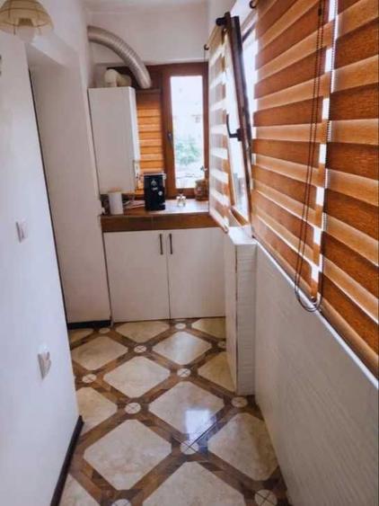 Apartament cu 3 camere decomandat în Băceni