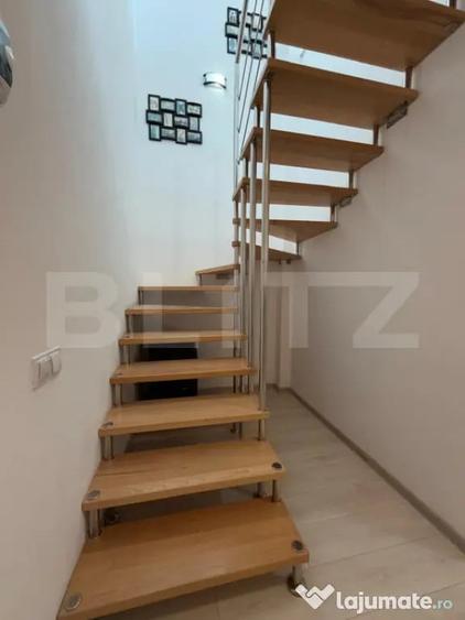 Apartament cu 4 camere semidecomandat în Tractorul