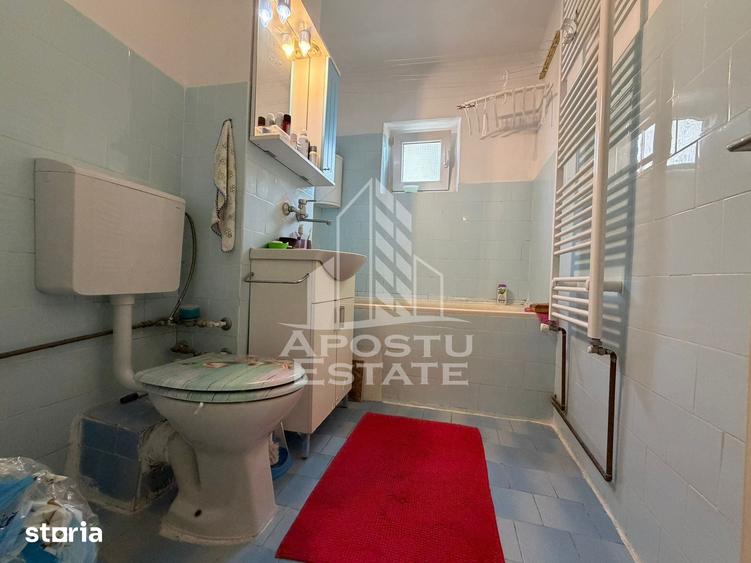 Apartament cu 3 camere decomandat în Buziașului