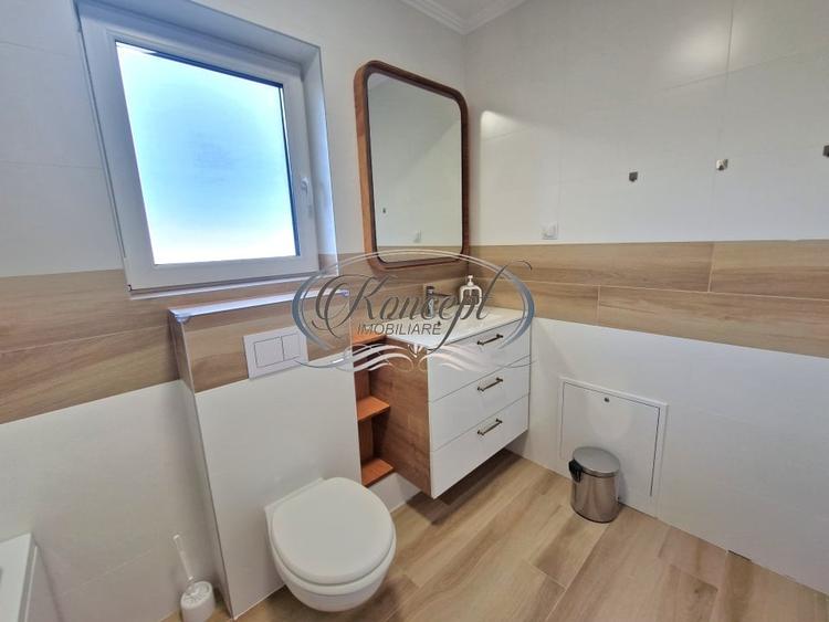 Apartament cu 4 camere semidecomandat, mobilat în Borhanci