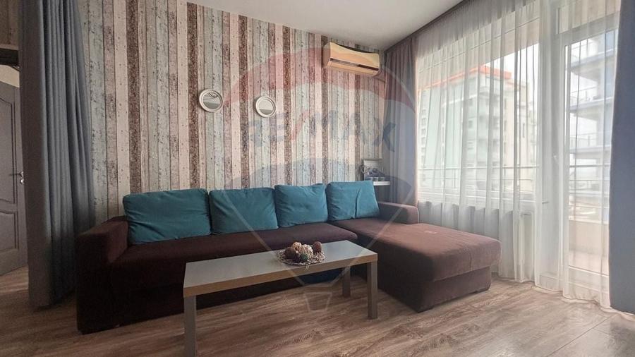 Apartament cu 2 camere semidecomandat, mobilat în Central
