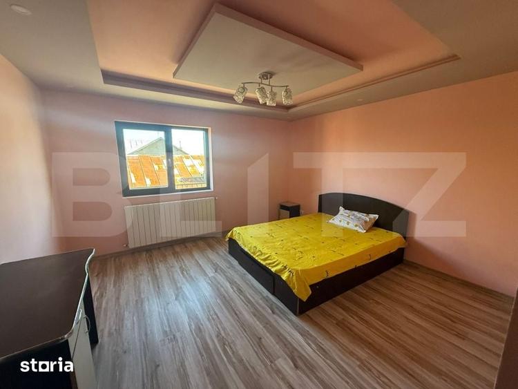 Casă cu 9 camere cu Teren 1000 Mp în Comișani