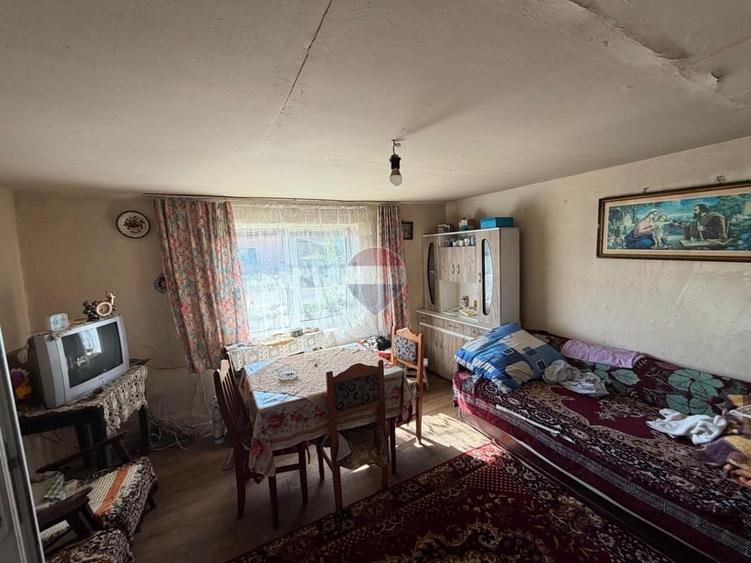 Casă individuală cu 2 camere cu Teren 1500 Mp în Bârgău