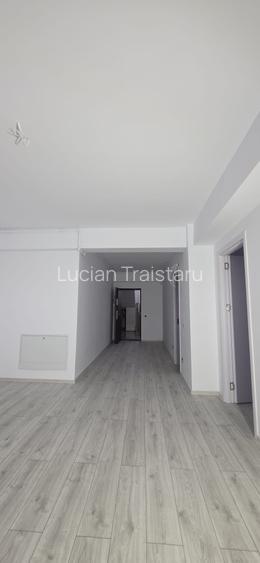 Apartament  cu balcon, demisol – construcție nouă-acces strada principala