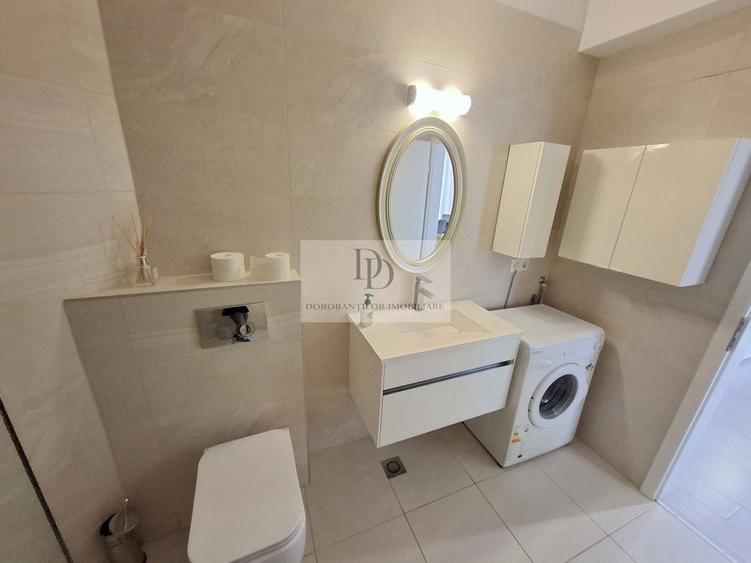 Apartament cu 2 camere semidecomandat, mobilat în Borhanci