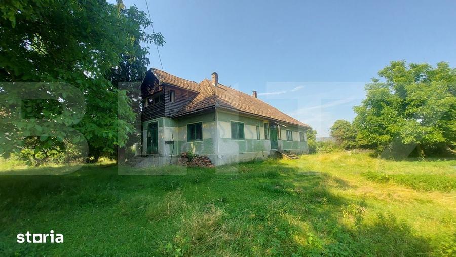 Casă cu 9 camere cu Teren 36000 Mp în Central